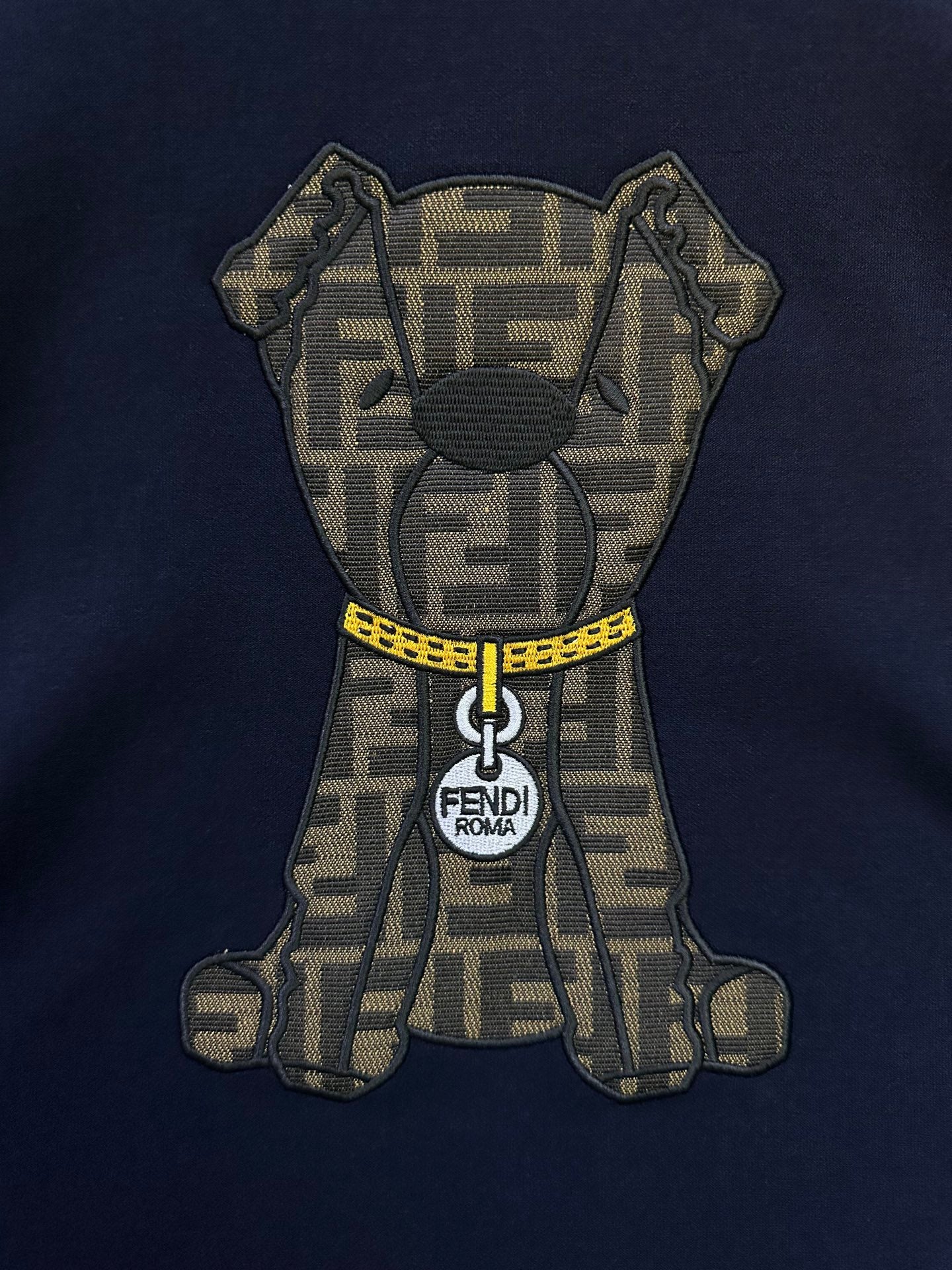 Dark navy T-shirt with embroidered teddy face graphic and FENDI Roma text