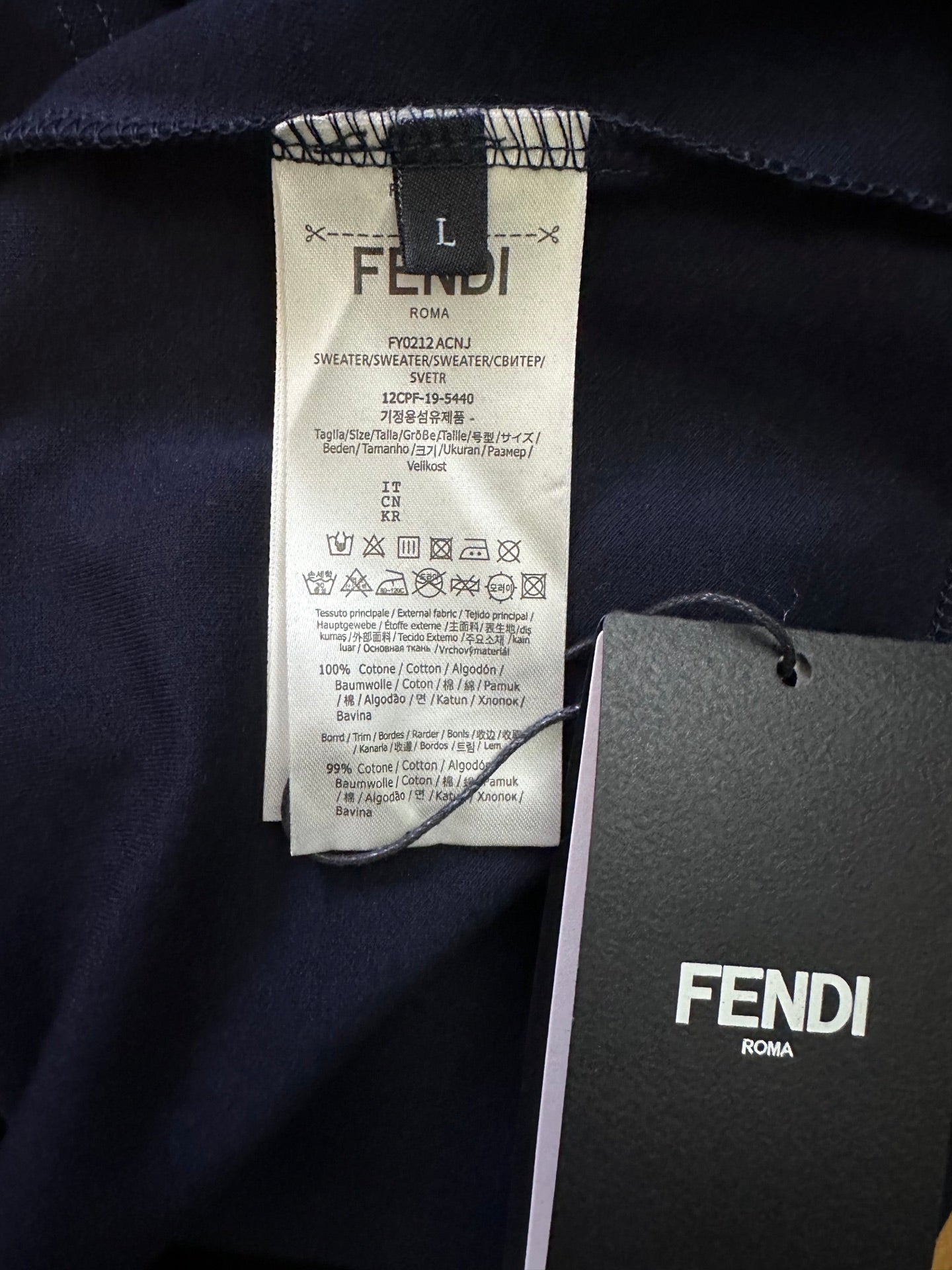 Dark navy T-shirt with interior care label and size tag