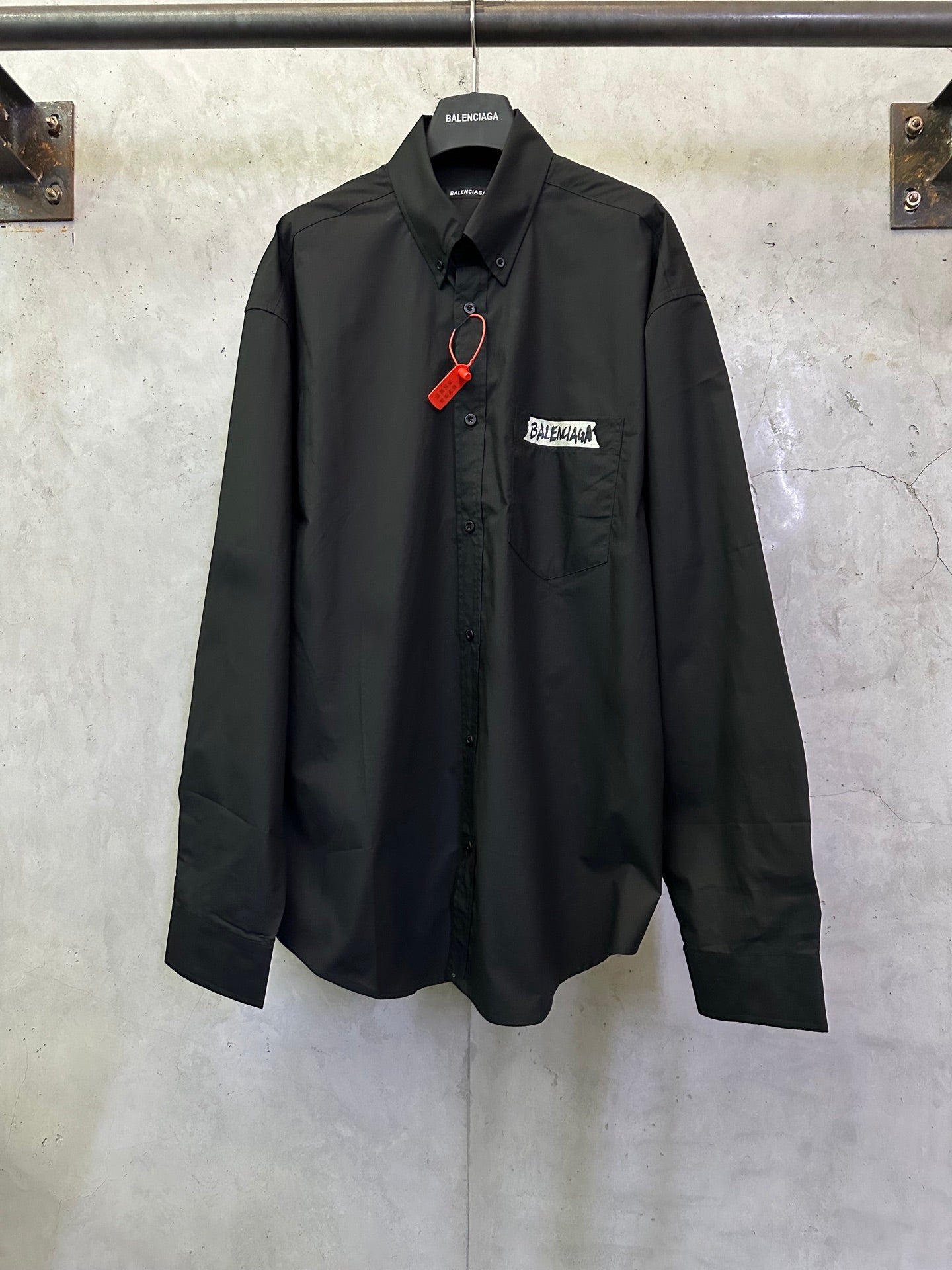 Balenciaga long-sleeve button-up shirt in black with point collar and chest patch pocket