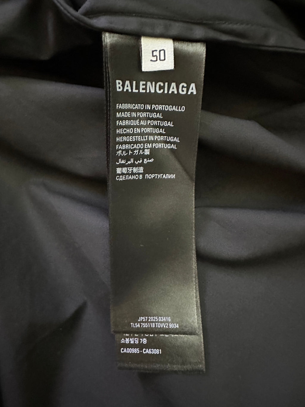 Balenciaga garment size and care label on black fabric