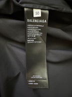 Balenciaga garment size and care label on black fabric