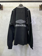 Black Balenciaga long-sleeve top, back view with large Balenciaga logo graphic