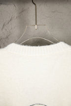White knit long-sleeve sweater, ribbed collar detail