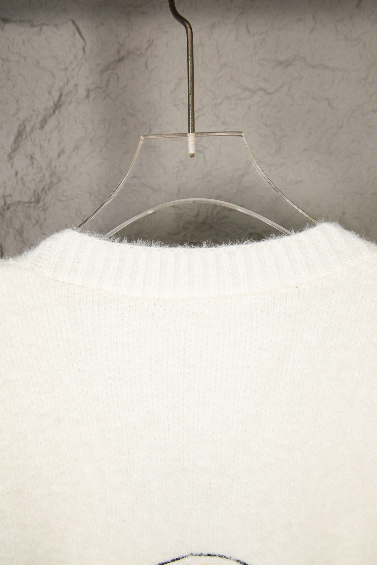 White knit long-sleeve sweater, ribbed collar detail