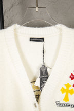 Cream knit cardigan with ribbed V-neck and inner brand label tag