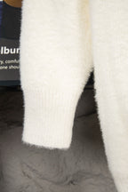 Cream fuzzy knit cardigan sleeve with ribbed cuff