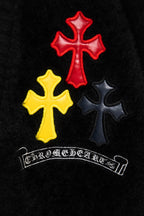 Black cardigan fabric with embroidered multicolor cross patches and arched logo text