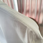 White Louis Vuitton T-shirt fabric close-up with smooth knit texture