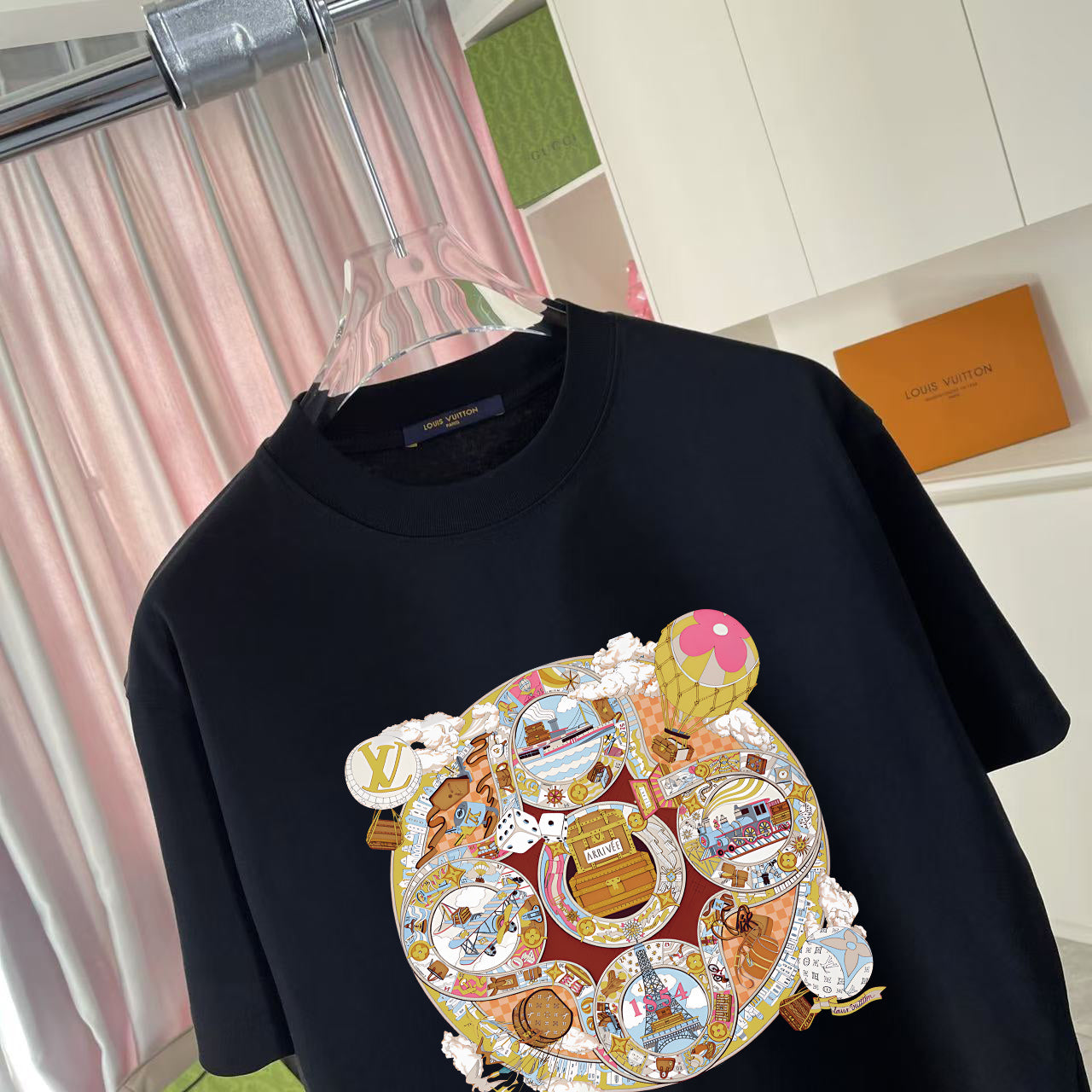 Black T-shirt with close-up multicolor Louis Vuitton-style graphic print