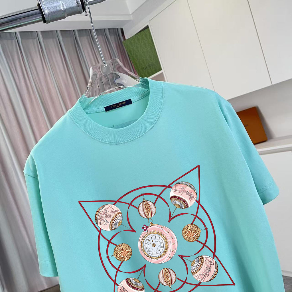 Turquoise T-shirt with large multicolor circular emblem graphic on chest