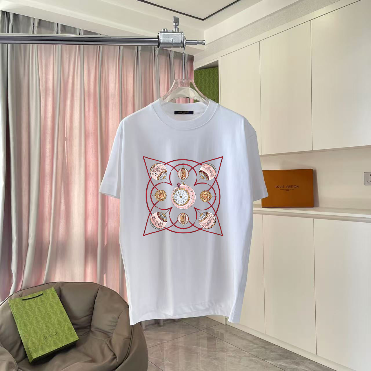 White short-sleeve T-shirt with Louis Vuitton graphic on the chest