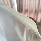 White T-shirt fabric close-up with visible knit texture