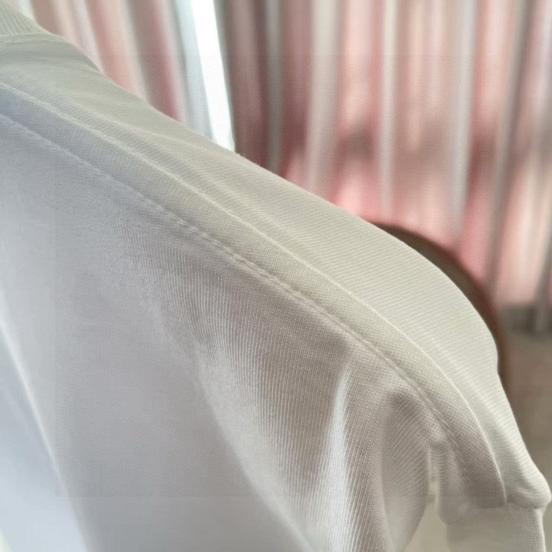 White T-shirt fabric close-up with visible knit texture