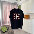 Louis Vuitton black crewneck T-shirt with red and gold circular graphic