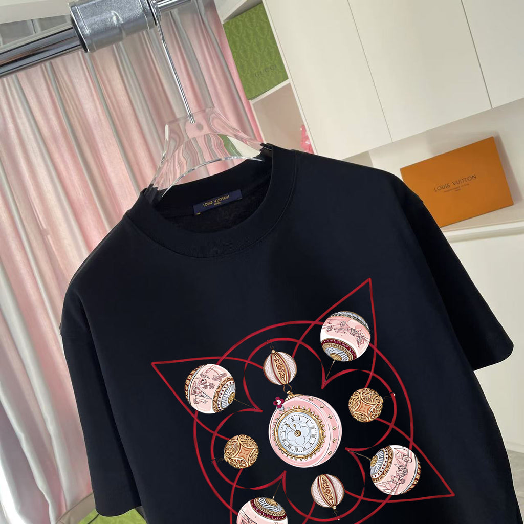 Louis Vuitton black crewneck T-shirt with large red-and-gold circular graphic, close-up