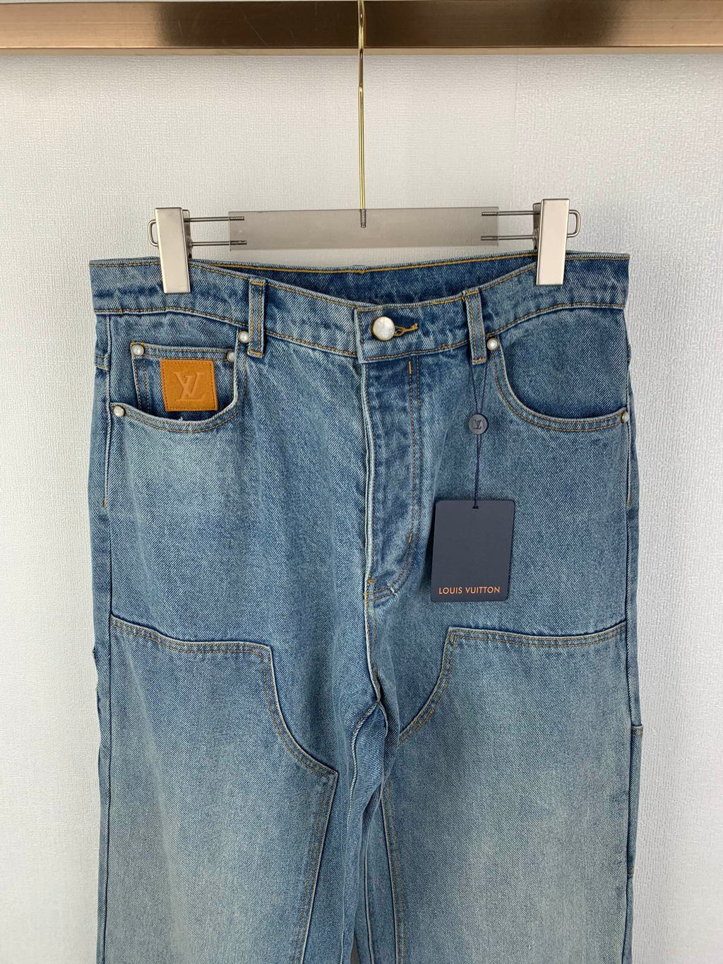 Louis Vuitton light blue denim pants with front pockets and LV logo patch