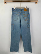Louis Vuitton light blue denim pants with multiple patch pockets and logo detail