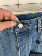 Louis Vuitton light blue denim pants with button closure and embossed coin pocket