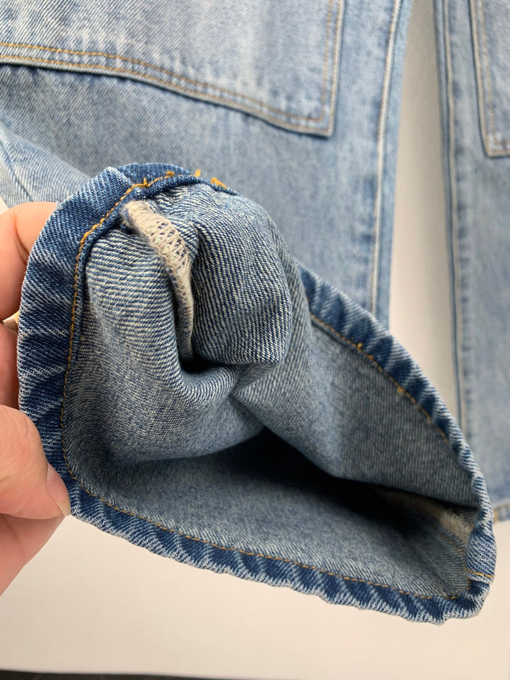 Louis Vuitton light blue denim pant cuff with stitched fold and inner seam