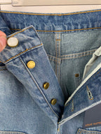 Denim pants with button closure, belt loops, and stitched front pockets
