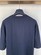 Navy short-sleeve T-shirt back view, showing crew neck and shoulders
