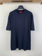 Navy short-sleeve T-shirt with crew neck and Gucci logo at chest