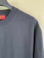 Navy T-shirt with small embossed Gucci double-G logo at chest