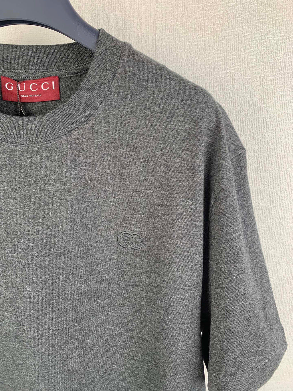 Heather gray Gucci crewneck T-shirt, red GUCCI label at neckline