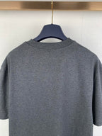 Heather gray crewneck T-shirt back view on hanger