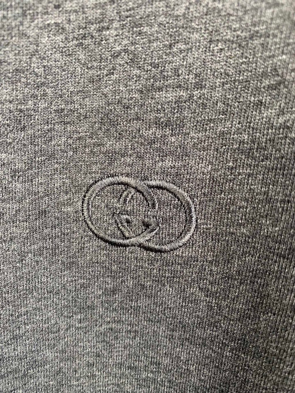 Heather gray Gucci crewneck T-shirt with small embossed GG logo