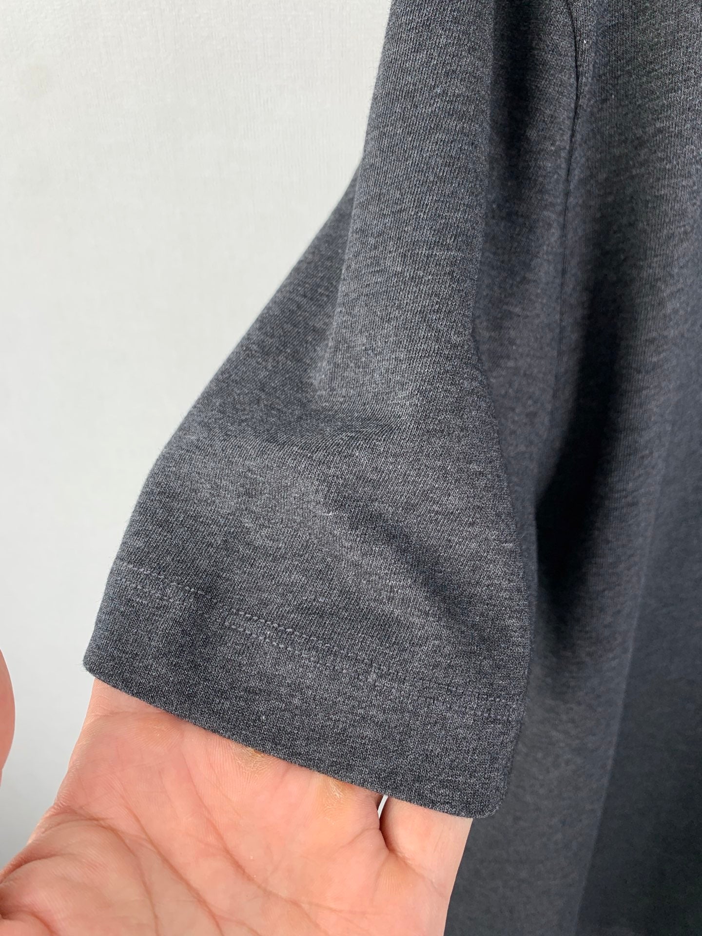 Heather gray T-shirt sleeve fabric close-up