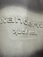 Close-up of dark gray T-shirt logo print and texture