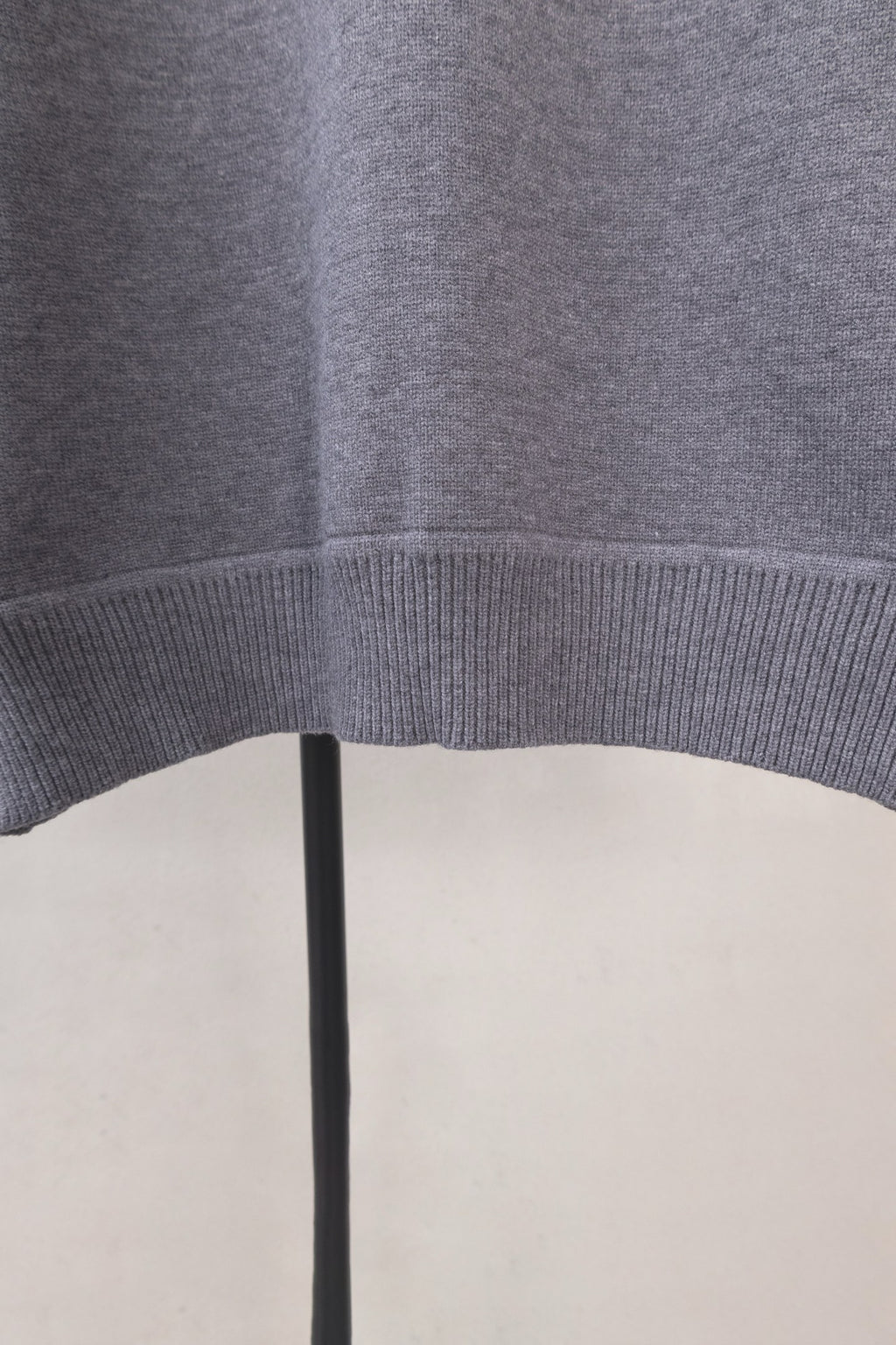 Long knit garment with ribbed hem, dark gray