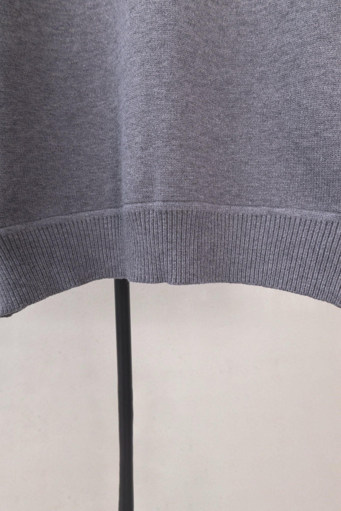 Long knit garment with ribbed hem, dark gray