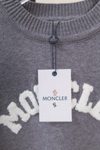 Moncler grey knit sweater with small zip at collar and MONCLER logo tag