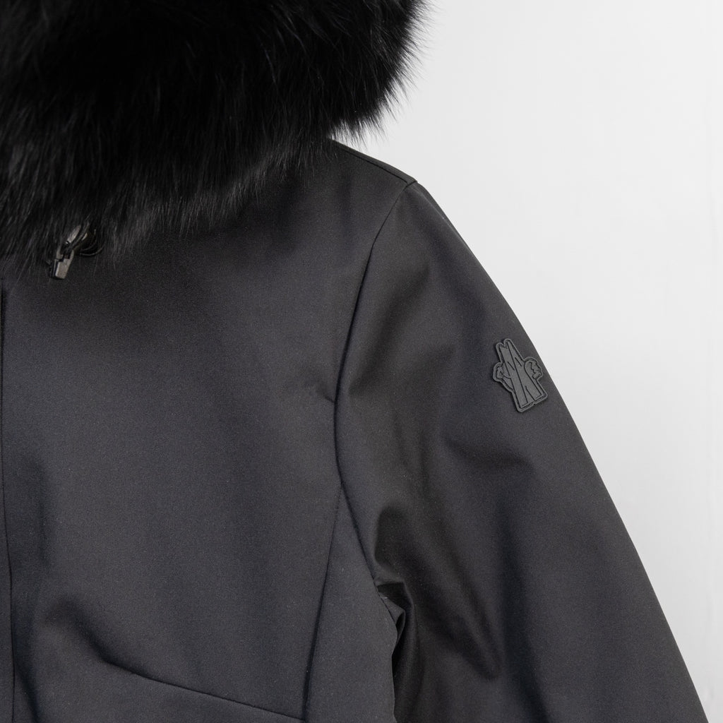 Moncler dark parka sleeve with embroidered logo detail