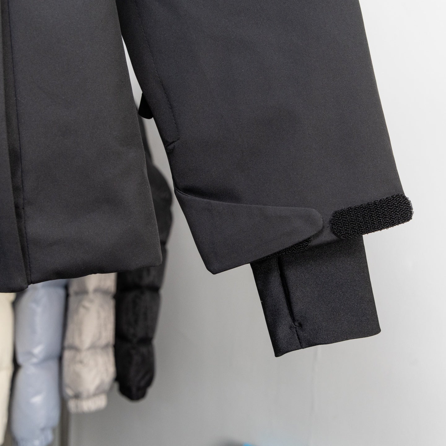 Moncler long puffer jacket cuff with elastic inner trim