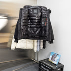 Moncler long parka with black puffer lining, faux-fur hood and front zip