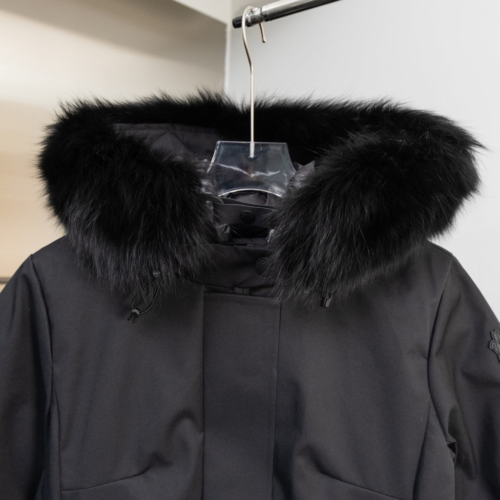 Moncler parka hood with thick faux fur trim and dark front placket