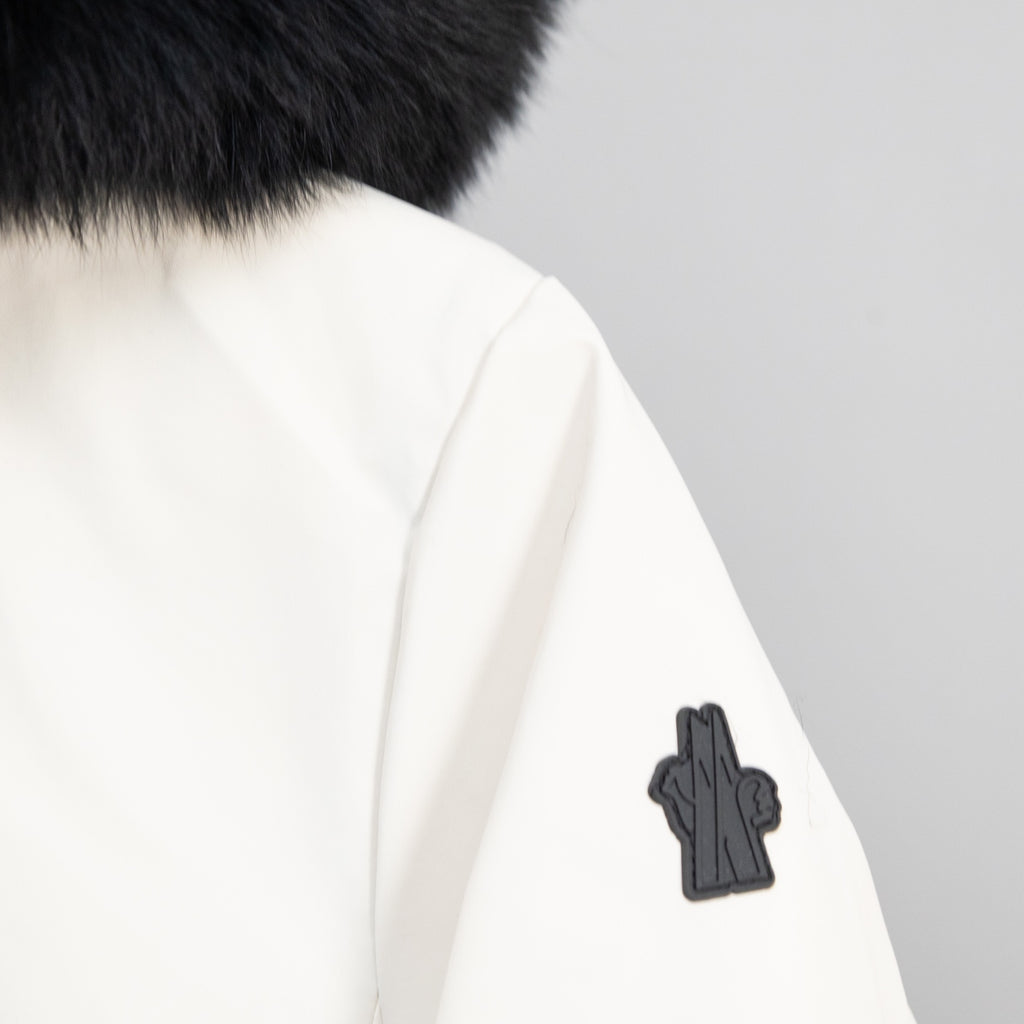 Moncler white jacket sleeve with dark logo patch