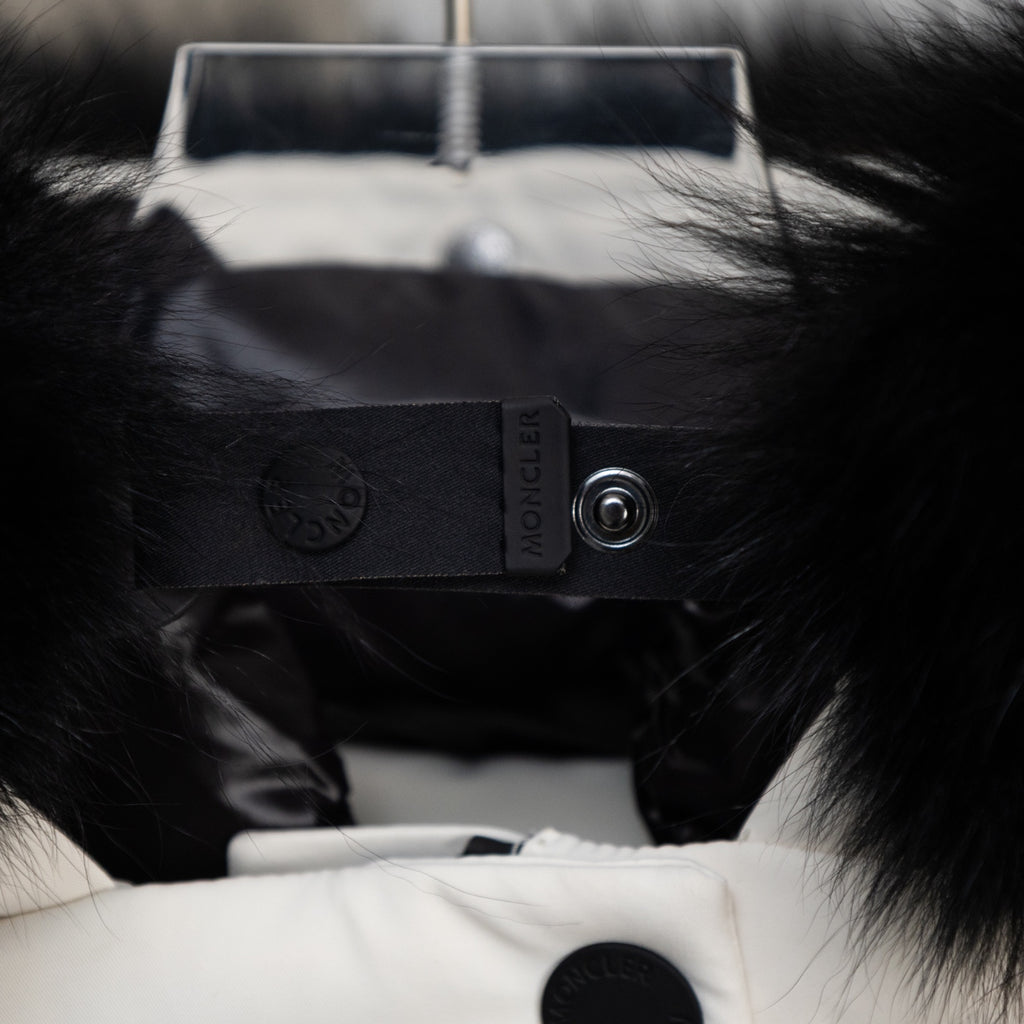 Moncler black inner hood label with snap and logo stamp