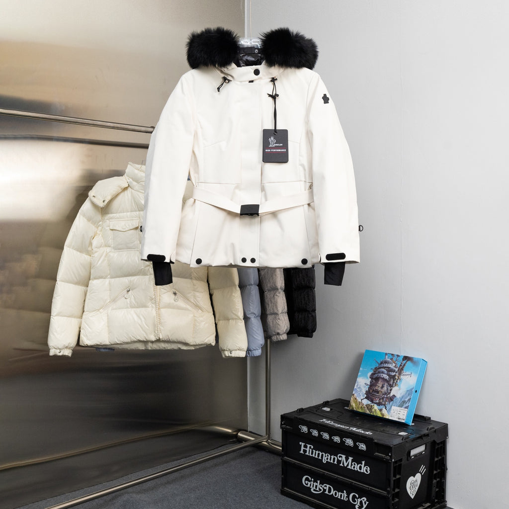 Moncler long white puffer jacket with fur-trimmed hood and snap belt