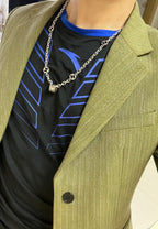 Silver-toned chain necklace with black enamel link charms on model torso