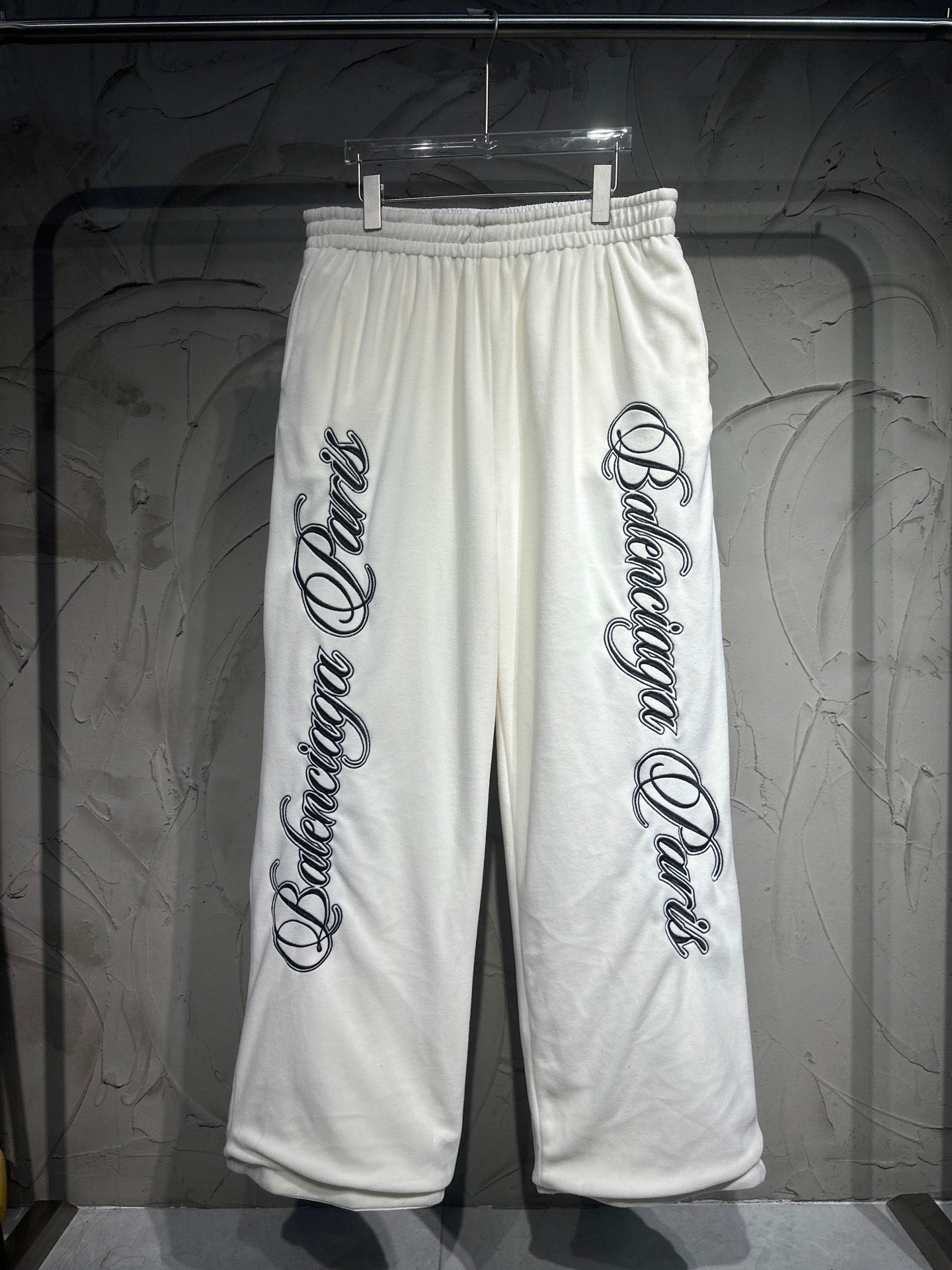 Balenciaga sweatpants, white with black vertical logo print on both legs, elastic waist