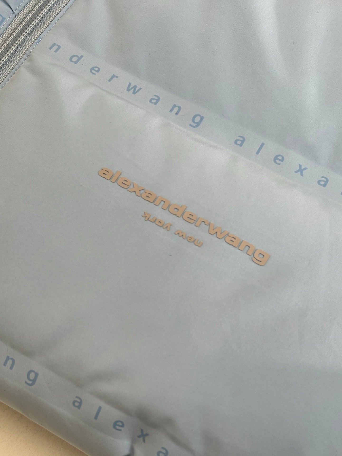Light blue puffer jacket lining with alexanderwang print