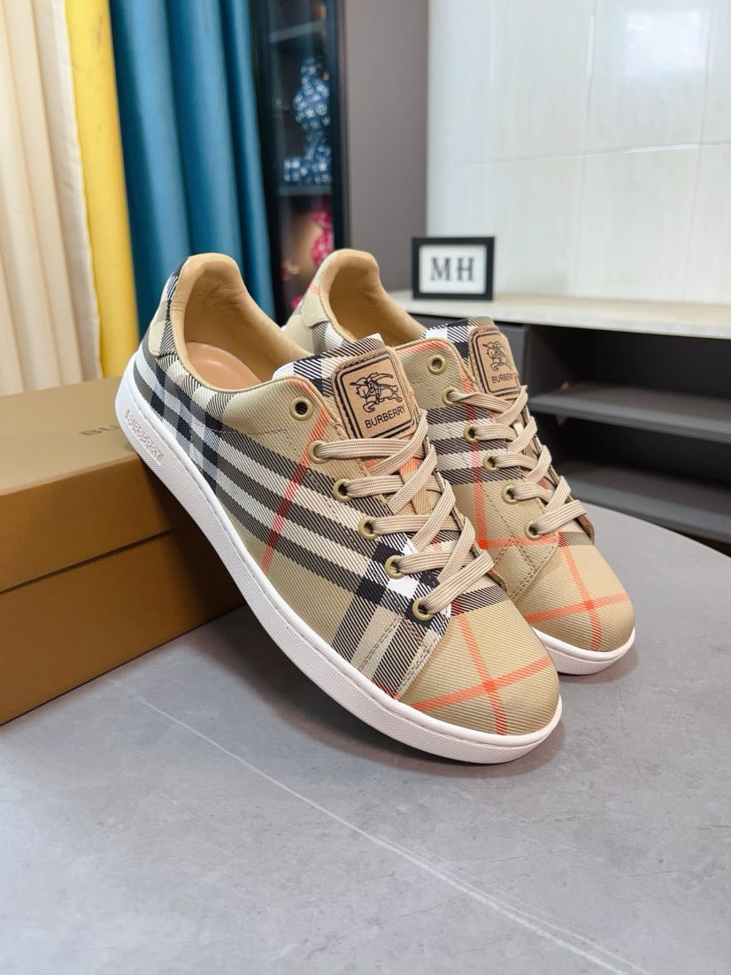 Beige check plaid low-top sneakers with lace-up closure and branded tongue label
