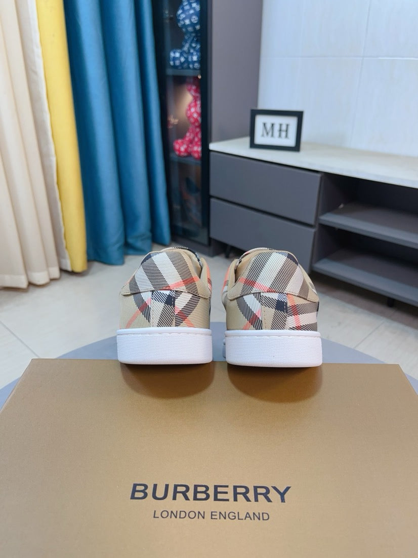 Beige check plaid low-top sneakers shown from the back with heel tabs