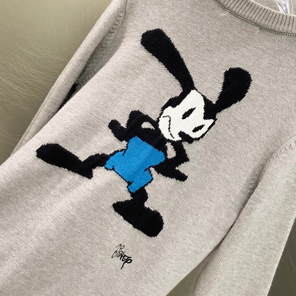 Givenchy knit sweater sleeve with close-up Mickey graphic in black and blue