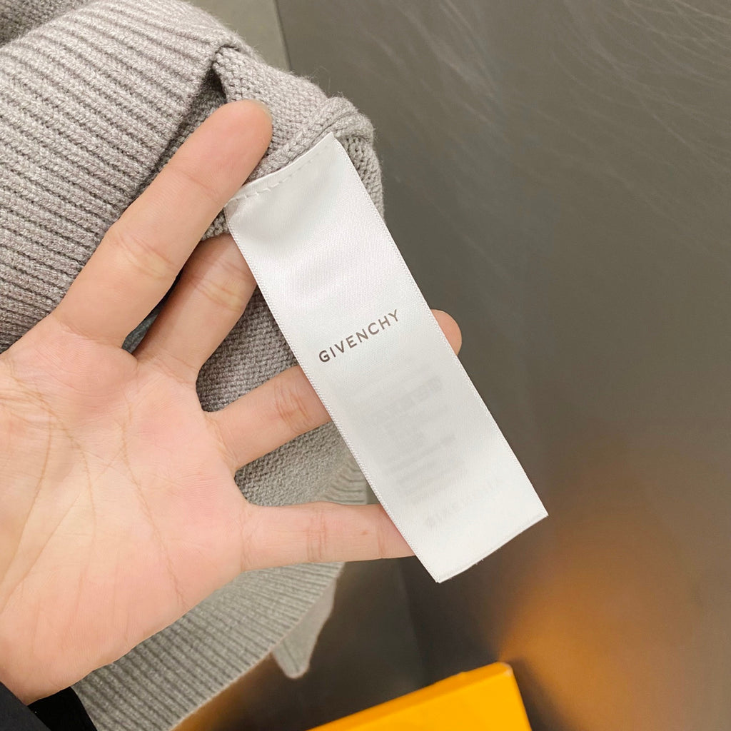 Givenchy knit sweater interior neck label on white tag