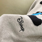 Givenchy knit sweater sleeve cuff with small black script logo detail